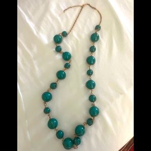Eye catching teal color bead necklace